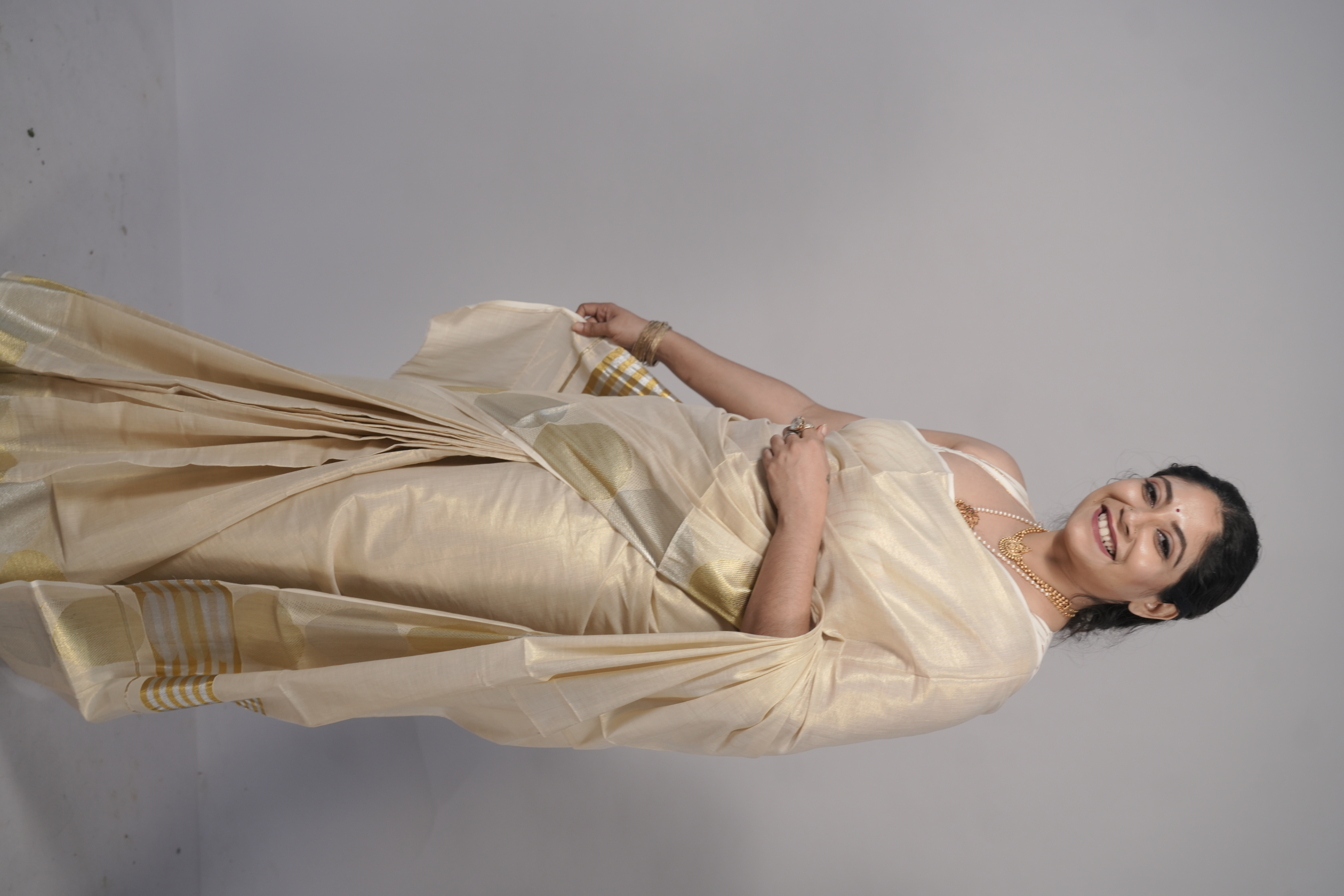 Golden Aura Kerala Saree